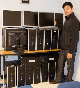 Mr. Flores with donated computers.