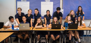 The high school Speech and Debate team with coach Erin Granillo-Walker, top left.