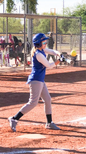 Lilly Zienkewicz connects with the ball during a recent game.