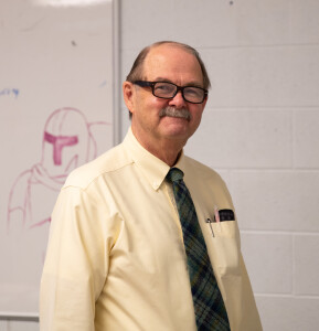 Dr. Evans is the Investment Club's adviser.
